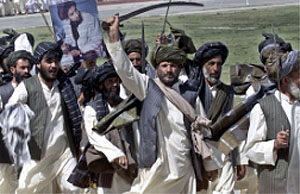 Afghans wave swords during independence day